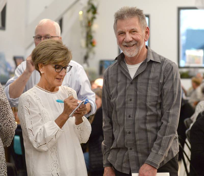 Merlin Hageman smiles as he waits to 'dash' to pick art during the Serenity Hospice and Home’s Fourth Annual Art Dash fundraiser on Wednesday, April 9, 2025, at River’s Edge Experience, 103 S. First St., Oregon.