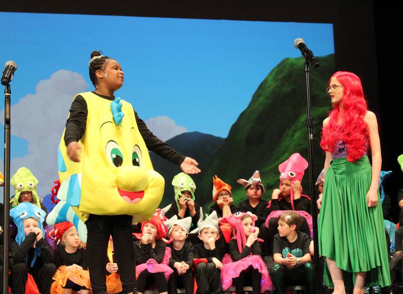 Flounder (Alaysia Hunter) tries to talk sense to Ariel (Piper Brandenburg) during the Streator Elementary Schools production of "The Little Mermaid Jr." Friday, May 5, 2023, at the Streator High School Auditorium.