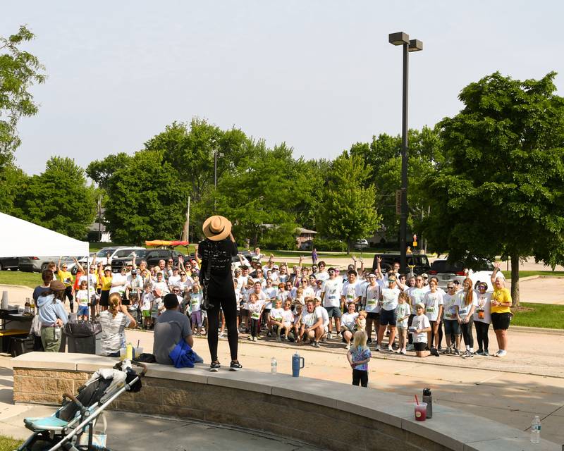 Participants pose for a photo after completing the CASA DeKalb County 5K Color Run on Saturday, June 7, 2025, held at the Sycamore Middle School.