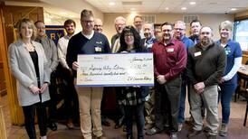 Illinois Valley Sunrise Rotary members donate to Oglesby, Spring Valley libraries
