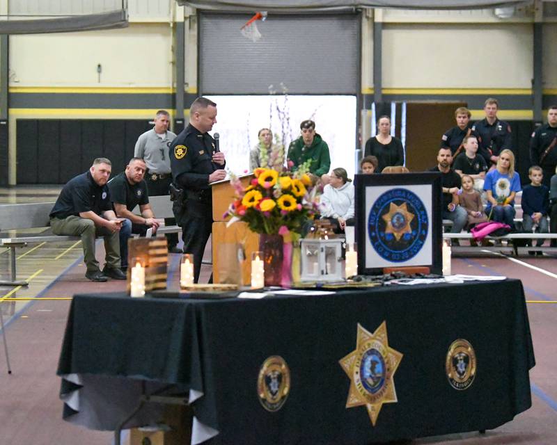 DeKalb County Sheriff Andy Sullivan speaks on Saturday, March 29, 2025, during a memorial vigil to mark one year since the late DeKalb County sheriff's deputy Christina Musil, 35, was killed in the line of duty in a rear-end car crash in Waterman while on patrol on March 28, 2024. The vigil was held at Sycamore High School's field house.