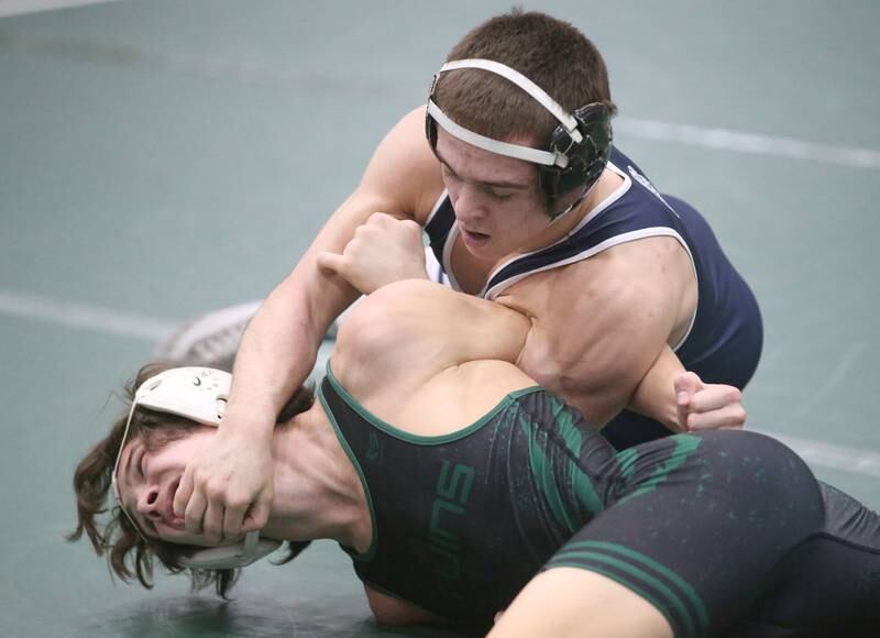 Lisle's Alexander Ferari wrestles St. Bede's Max Moreno in the 126 pound weight class during the Class 1A Regional meet on Saturday, Feb. 8, 2025 at St. Bede Academy.