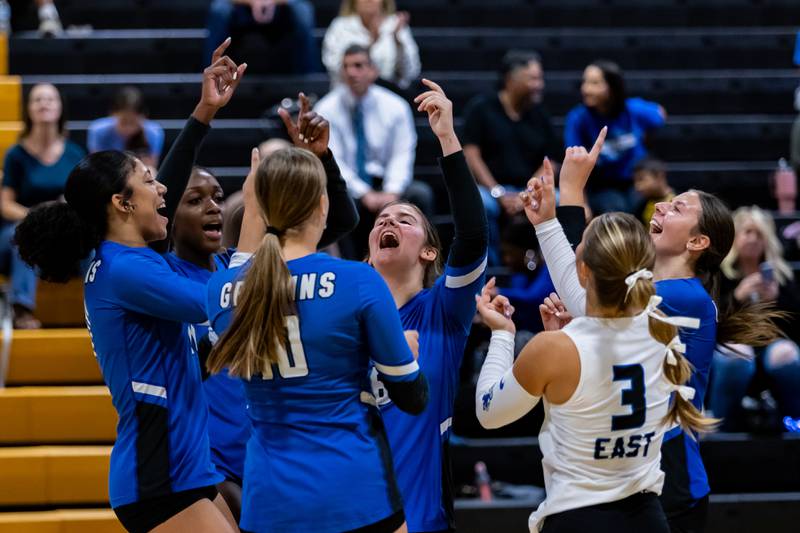 Lincoln-Way East celebrates scoring against Joliet West during a Varsity Volleyball match at Joliet West on Aug. 26, 2025.