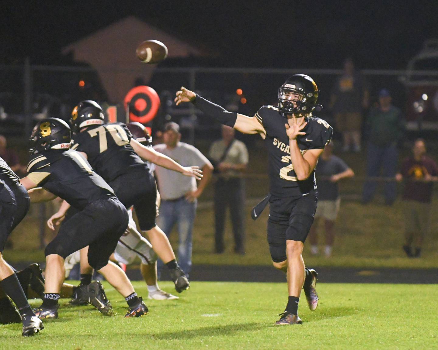 Sycamore QB Elijah Meier (2) throws for a pass in the first quarter while taking on Richmond-Burton on Oct. 1st.