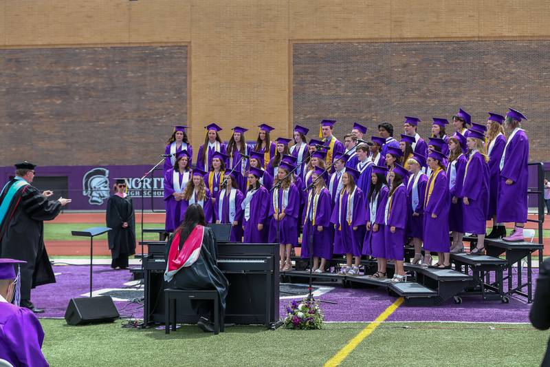 The A Cappella Choir performs during the Downers Grove North graduation ceremony at the school on Sunday, May 22, 2022