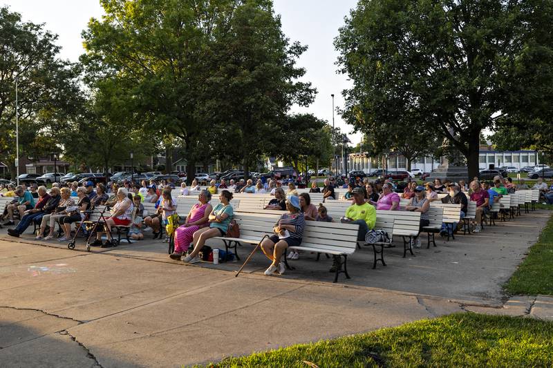 Music fans listen as the Sterling Municipal Band plays Wednesday, July 16, 2025.