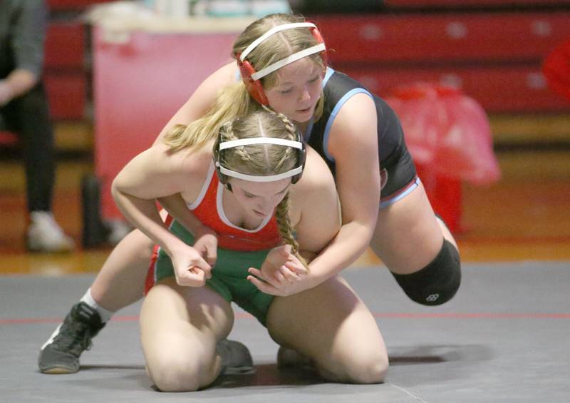L-P's Avalyn Edwall wrestles Ottawa's Alexis Rogers on Thursday, Jan. 9, 2025 in Sellett Gymnasium at L-P High School.