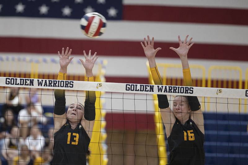 Sterling’s Sydney Giffin (left) and Kasey Weeks go up for a block against Alleman Thursday, Sept. 25, 2025.