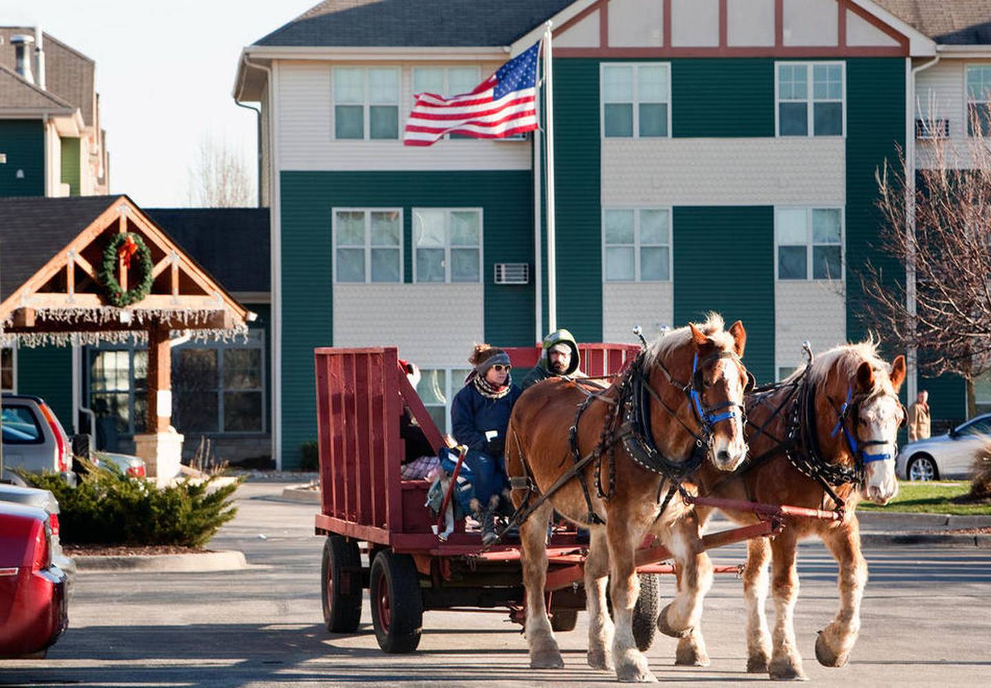 Draft horses for hay rides tour the parking lot during the “Santa and the Timbers’ Elves” party at The Timbers of Shorewood retirement community on Dec. 19, 2015, in Shorewood.