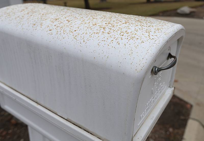 The top of a mailbox is covered with oxidizer from the Carus Chemical plant fire on Thursday, Jan. 12, 2023 in La Salle.