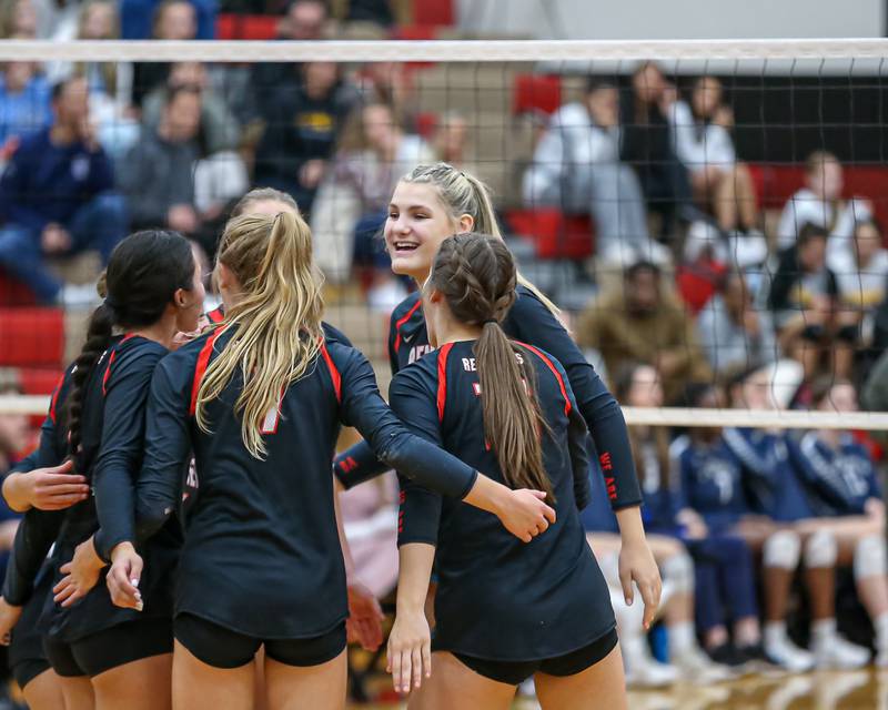 Benet Academy celebrates a point during Class 4A Plainfield North Sectional semifinal match between Oswego East at Benet. Oct 31, 2022.