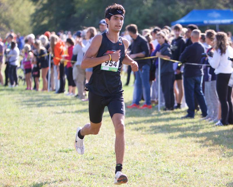 Wheaton Warrenville South's Josiah Narayanan heads for the finish line at the St. Charles North Cross Country Invitational on Saturday, Oct. 5,2024 AT LeRoy Oaks Forest Preserve in St. Charles.