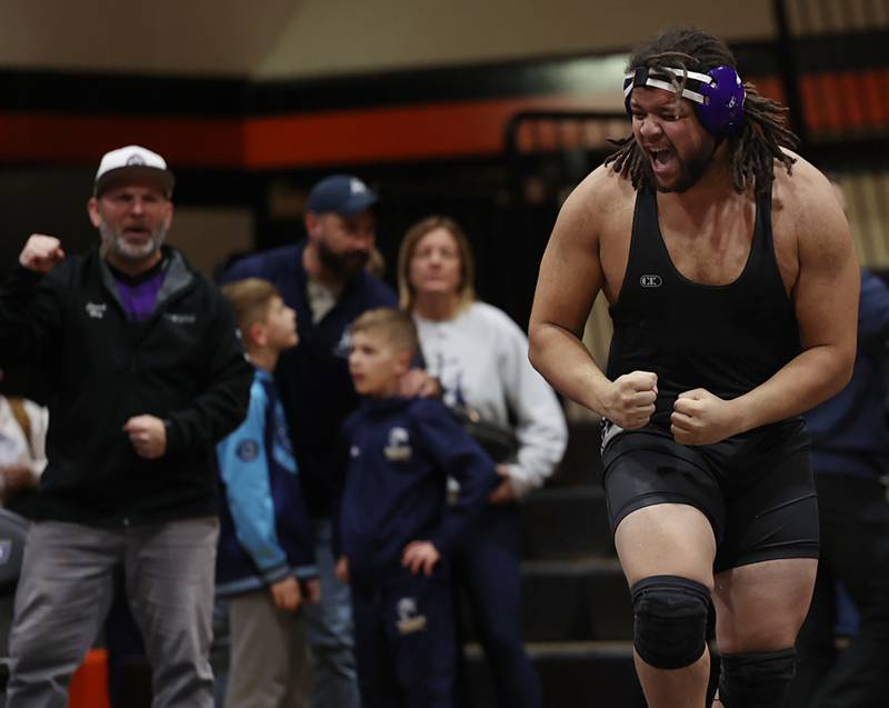 Dixon’s Dylan Bopes celebrates his pin of Richmond-Burton’s Breckin Campbell  in the 285 pound third place match Saturday, Feb. 14, 2026, during the Class 1A wrestling sectionals in Byron.