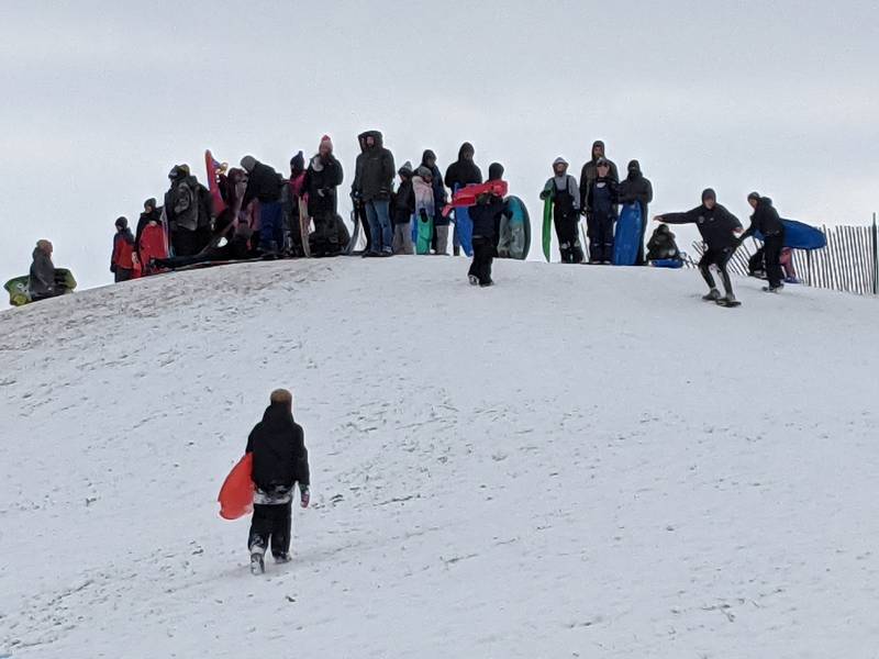 Plenty of people were sledding on the hill at Oswegoland Park District's Prairie Point Community Park on Sunday, Nov. 30, 2025.