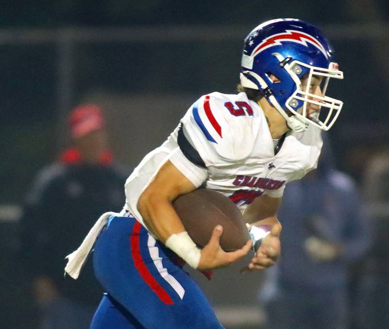 Dundee-Crown’s Isaac Grzynkowicz runs the ball in varsity football  at Jacobs High School in Algonquin on Friday, Oct. 10, 2025.