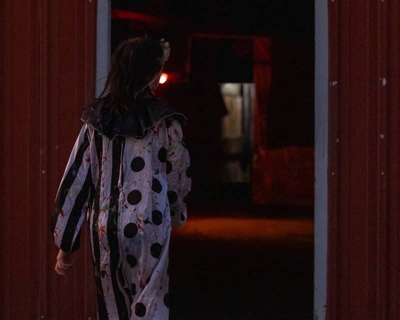 Haunted house performer walks back into Haunted Barn at the Monster Mash Balloon Bash on Saturday, Oct. 4, 2025 at the Bureau County Fairgrounds in Princeton.