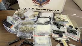 Two charged in Bureau County after cops seize guns, cocaine, cash