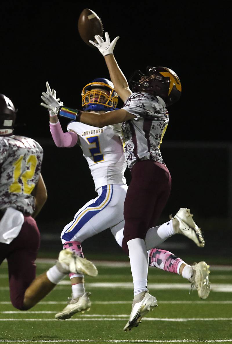 Richmond-Burton's Jack Martens, right,  breaks up a pass intended for Johnsburg's Ian Boal during a Kishwaukee River Conference football game Friday, Oct. 7, 2022, between Richmond-Burton and Johnsburg at Richmond-Burton Community High School in Richmond.