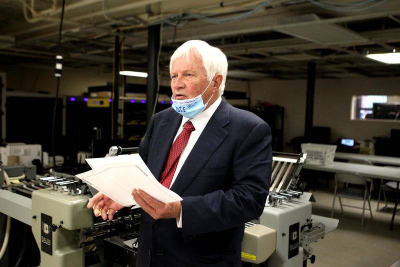 Kane County Clerk Jack Cunningham gives a demonstration of how the office plans to handle an influx of mail-in ballots for the Nov. 3 General Election.