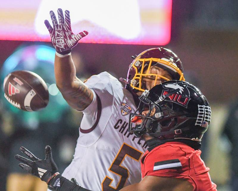 Northern Illinois University’s Trayvon Rudolph, right, tries to catch the ball in the endzone on Saturday Nov. 30, 2024, but came up short while being defended by Central Michigan’s Da’Raun McKinney held at Huskie Stadium in DeKalb.