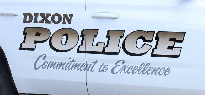 Dixon police squad car is parked at the headquarters for police and fire.