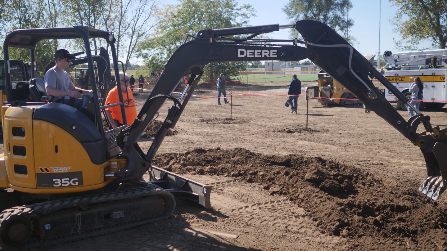 A student from Marengo High School tests heavy machinery on Oct. 8, 2024, during SkillsUSA Illinois' first Industry Pathways Career Experience event at Johnsburg High School.