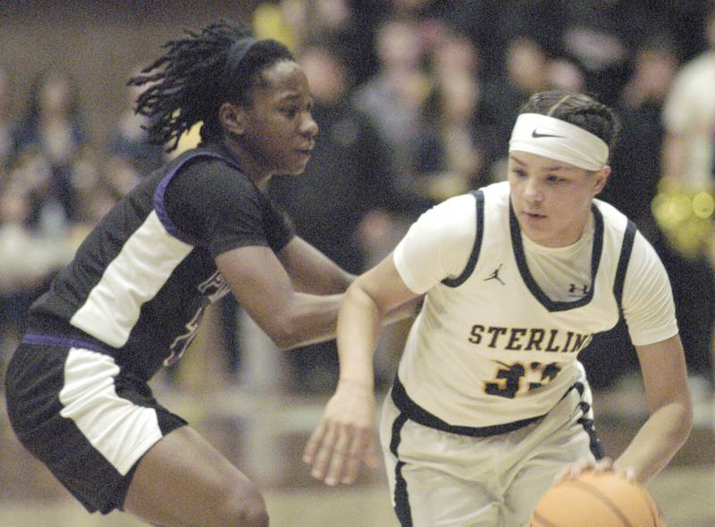 Sterling's Joslynn James gets past Plano's Sanai Young. The Sterling Golden Warriors faced off against Plano Lady Reapers in an IHSA 3A Regional girls final at Musgrove Fieldhouse in Sterling on February 20, 2025. Sterling won the game 70-38.