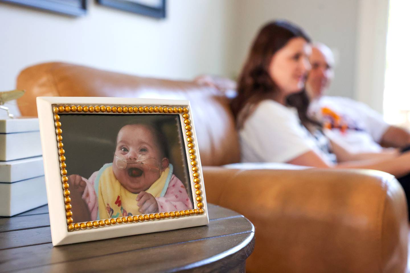 A photo of Mattea Joy Freedlund sits prominently in the Bourbonnais home of Jamie and Gary Freedlund on July 3, 2025. The Freedlunds, who run Mattea's Joy, a nonprofit that supports families with hospitalized children which they started in honor of their late daughter, Mattea, spoke on the experience of navigating the recent cancer diagnosis and treatment of their 13-year-old son, Cooper.