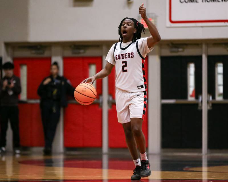 Bolingbrook's Darius Hudson (2) calls out a play during their basketball game between Plainfield North at Bolingbrook, Friday Dec 13, 2024 in Bolingbrook.