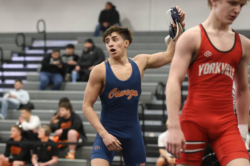 Oswego’s Aiden Ortiz defeats Yorkville’s Nolan Chrisse in overtime in the SouthWest Prairie Conference 138 pound championship on Saturday, Jan. 24, 2026 in Minooka.