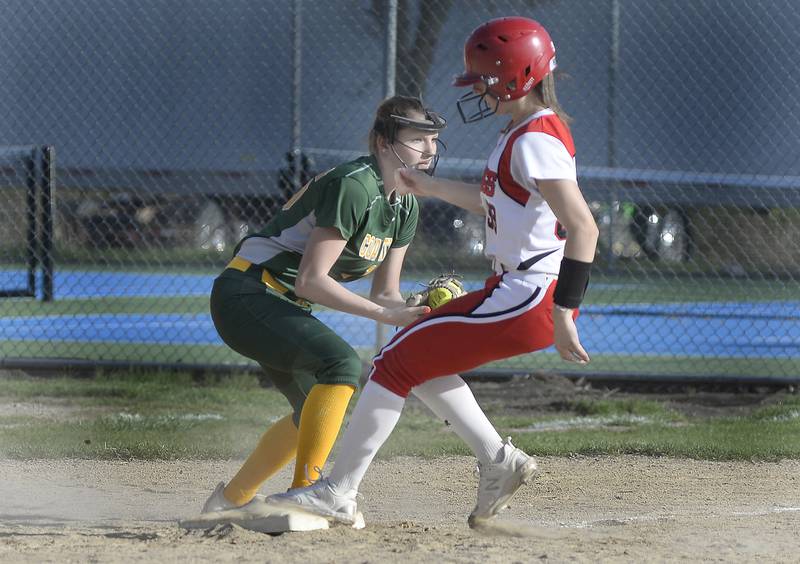 Coal City’s Abby Gagliardo is late with the tag as Streator’s Makenna Ondrey gets into third safely in the 3rd inning on Tuesday, April 18, 2023 at Streator High School.