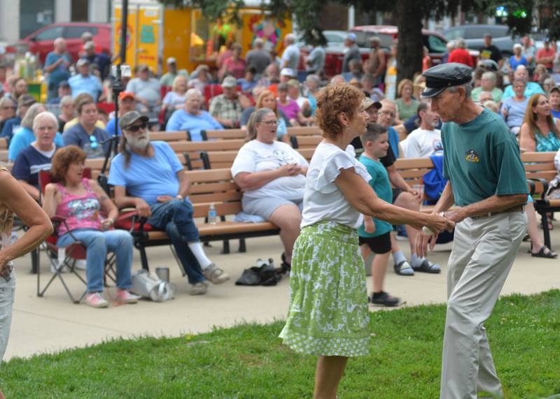 George and Nancy Poe of Mt. Morris dance to the rock and roll music of Captain Rat and the Blind Rivets at the Mt. Morris Jamboree concert on Friday, Aug. 15, 2025.