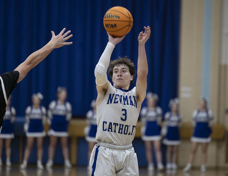 Newman’s Garret Matznick puts up a shot against Kewanee Friday, Jan. 10, 2025.