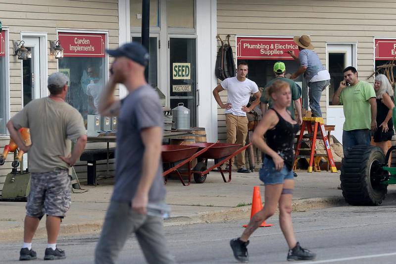 Film crews work to transform downtown Hebron into a 1950s scene for the filming of "Lovecraft Country," an HBO series, on Aug. 27, 2018.