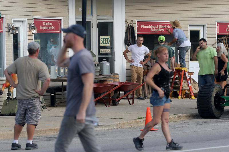 Film crews work to transform downtown Hebron into a 1950s scene for the filming of "Lovecraft Country," an HBO series, on Aug. 27, 2018.