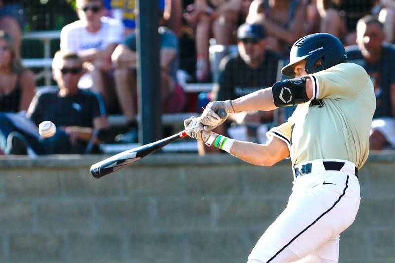 Sycamore's Kiefer Tarnoki (7) connects during the second inning of an Illinois Class 3A super-sectional, Monday, June 5, 2023, in Geneseo.