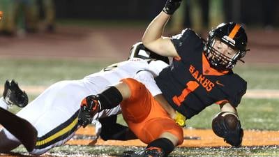 Photos: DeKalb football hosts Metea Valley