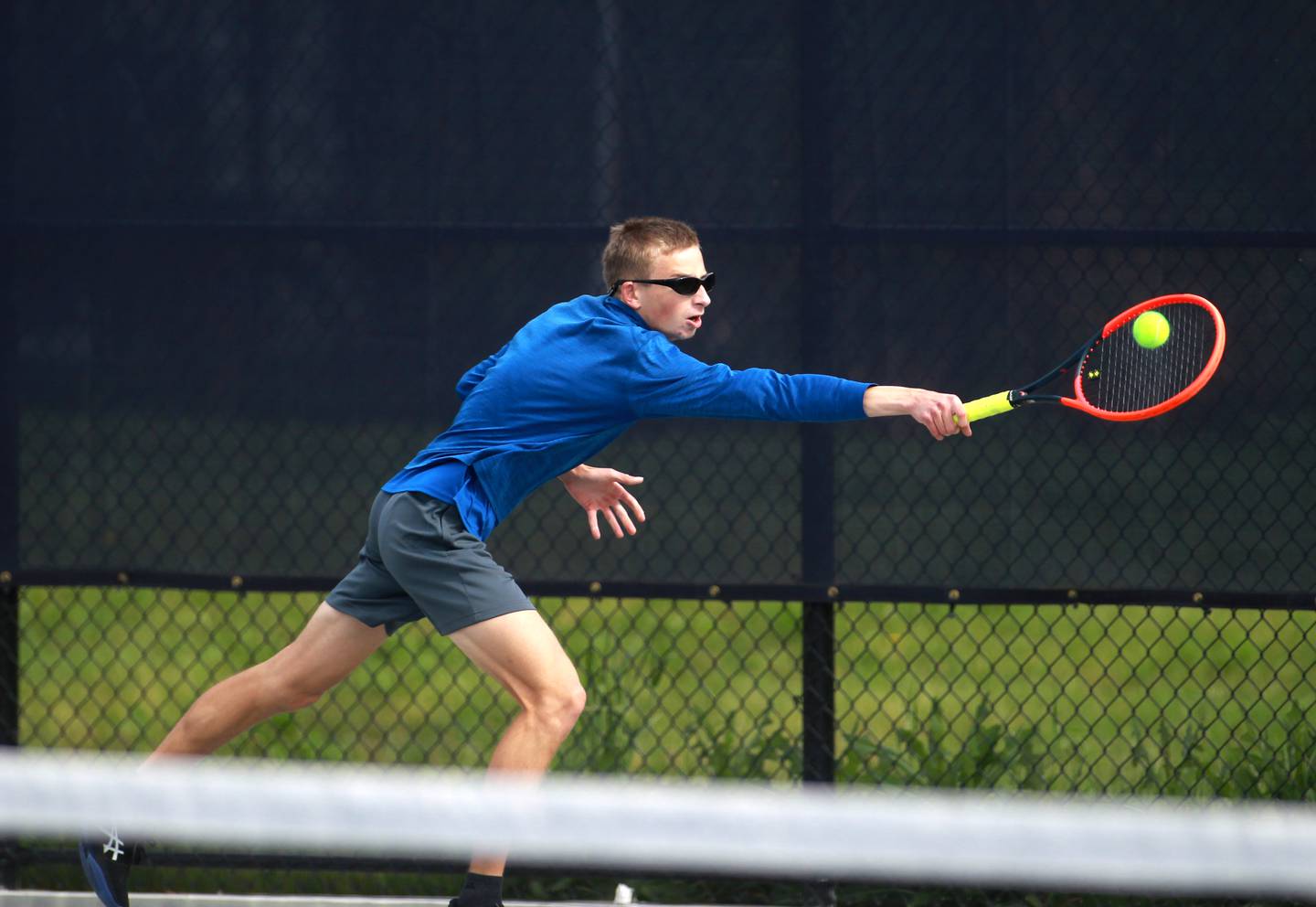Johnsburg’s Tyler Batt returns the ball during the first round of the 1A boys state tennis meet on Thursday, May 29. 2025 at Buffalo Grove High School.