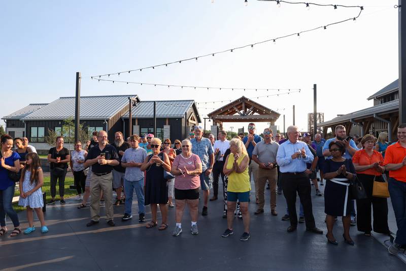 Attendees applaud as the ribbon is cut at Bradley's 315 Sports Park during a Bradley Business After Hours event on Tuesday, July 29, 2025.