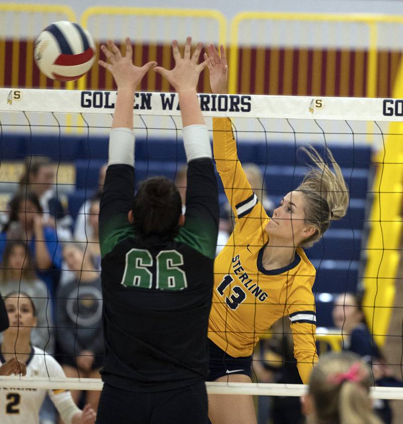 Sterling’s Marley Sechrest hammers a shot against Alleman Tuesday, Oct. 22, 2024, in Sterling.