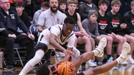 Reggie McWaine’s big shots help Oswego East rally past Yorkville in matchup of short-handed clubs