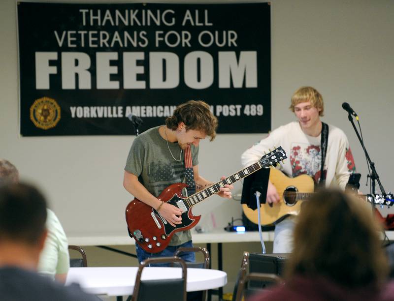 Ripped Jeans Duo members, Levi Cull (left) and Matthew Ripsch perform indoors during a smaller Fun Fest, due to Sunday morning's rain, on May 26, 2024, at the Yorkville American Legion Post 489.
