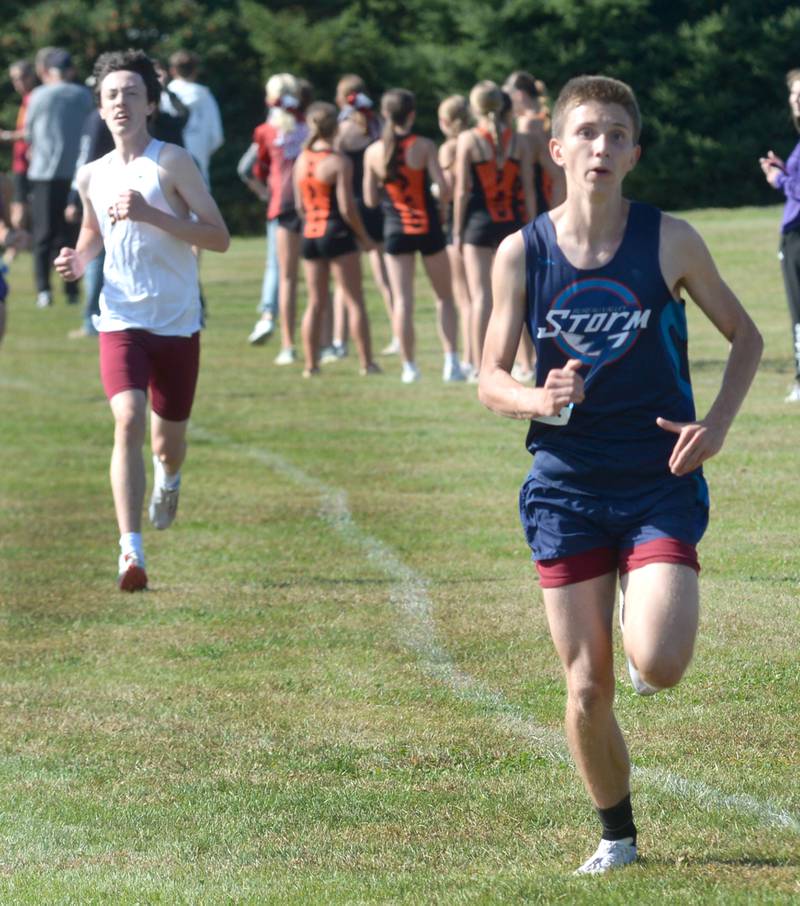 Bureau Valley's Maddux Moore (right) heads to the finish line of the Oregon Cross Country Open on Saturday, Sept. 6, 2025 at Oregon Park West. He finished 35th.