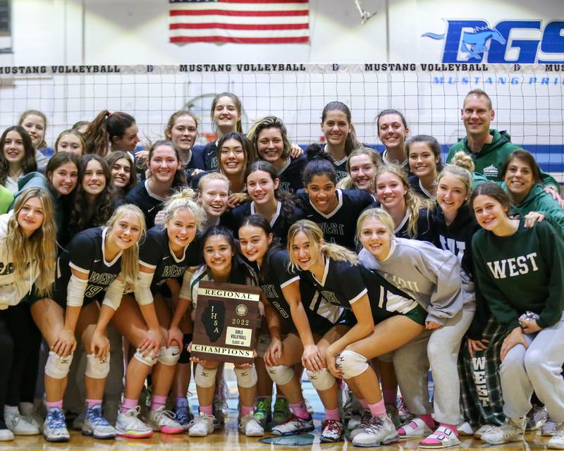 Glenbard West poses with the Class 4A Downers Grove South Regional final plaque after defeating Wheaton North. Oct 27, 2022.