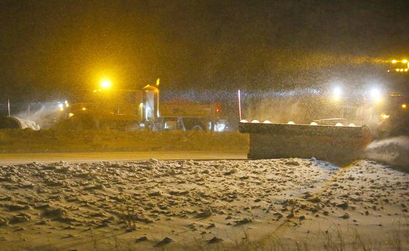 A pair of snowplows push snow on Interstate 80 on Thursday, Jan. 18, 2024 in Bureau County.