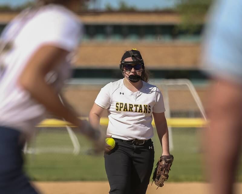 Marian Catholic's Katie Pollock (21) prepares to pitch during Class 3A Joliet Catholic Sectional final game between Marian Catholic at Lemont.  June 3, 2022.