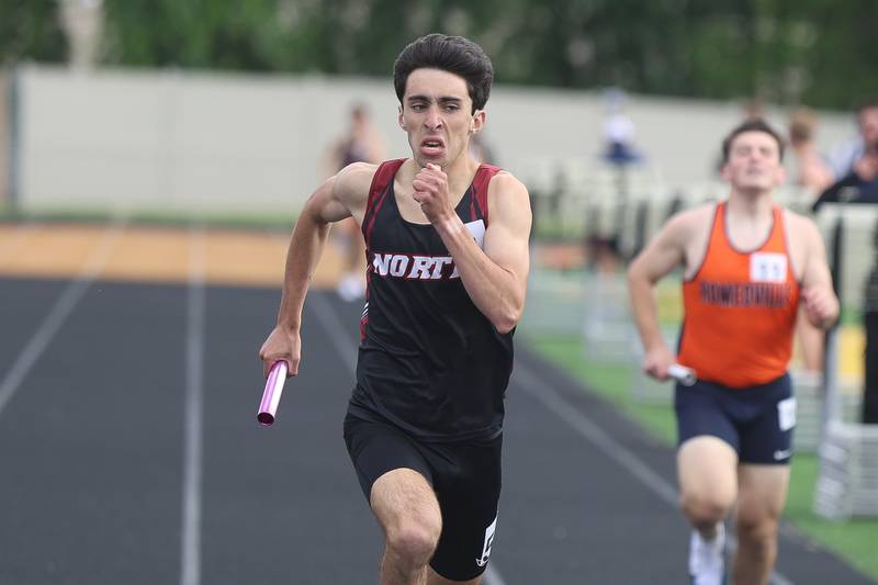 Plainfield North’s Aidan Connors crosses the finish line first in the 4x800 Meter Relay in the Southwest Prairie Conference boys track and field championship on Wednesday, May 13, 2026 at Joliet West High School.