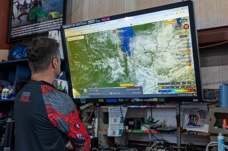 Zsolt Paroczi watches on for weather delay to be lifted on Wednesday, Aug 20, 2025 at Skydive Chicago in Ottawa.
