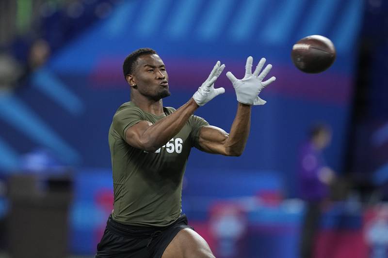 Minnesota defensive back Tyler Nubin runs a drill at the NFL football scouting combine, Friday, March 1, 2024, in Indianapolis. (AP Photo/Darron Cummings)