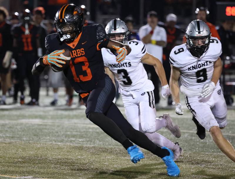 DeKalb's Davon Grant gets behind the Kaneland defense for a long touchdown catch during their game Friday, Sept. 12, 2025, at DeKalb High School.